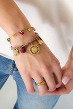 Bloemen armband met bedeltjes
