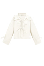 Kiana Jasje met Strikdetails